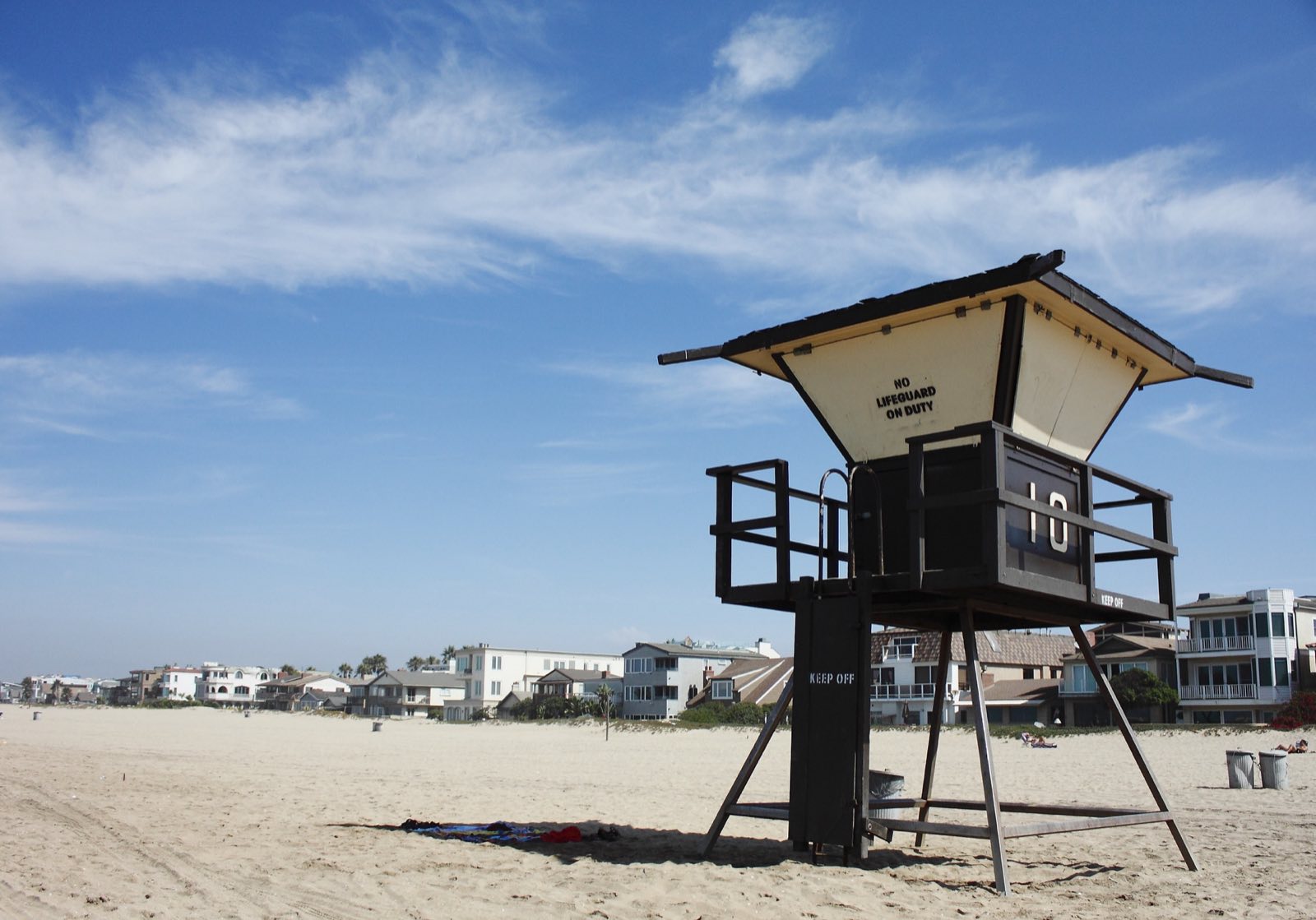 A lifeguard tower on the sand at Sunset Beach