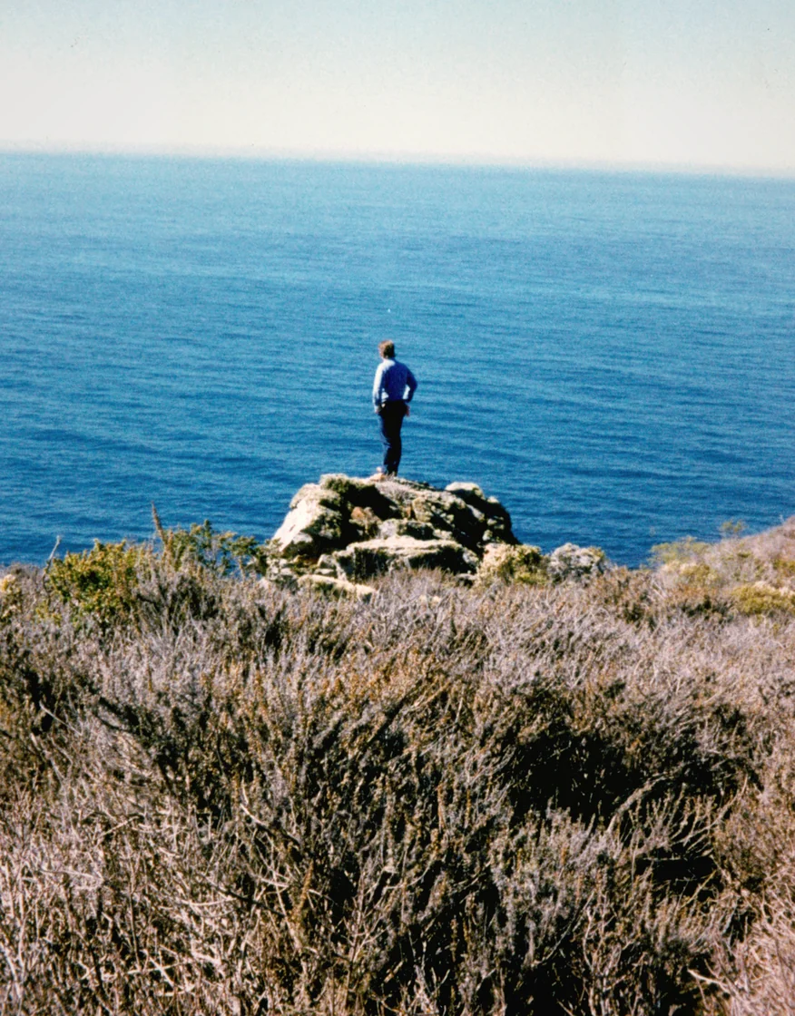 John Handy looking out over the land that would become Treebones Resort. Big Sur, 1986