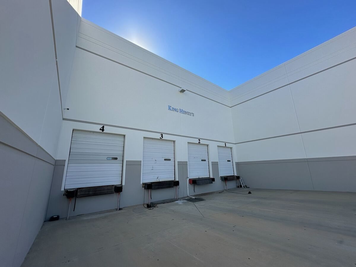 King Henry’s building in Valencia, tilt-up panels repaired and refinished
