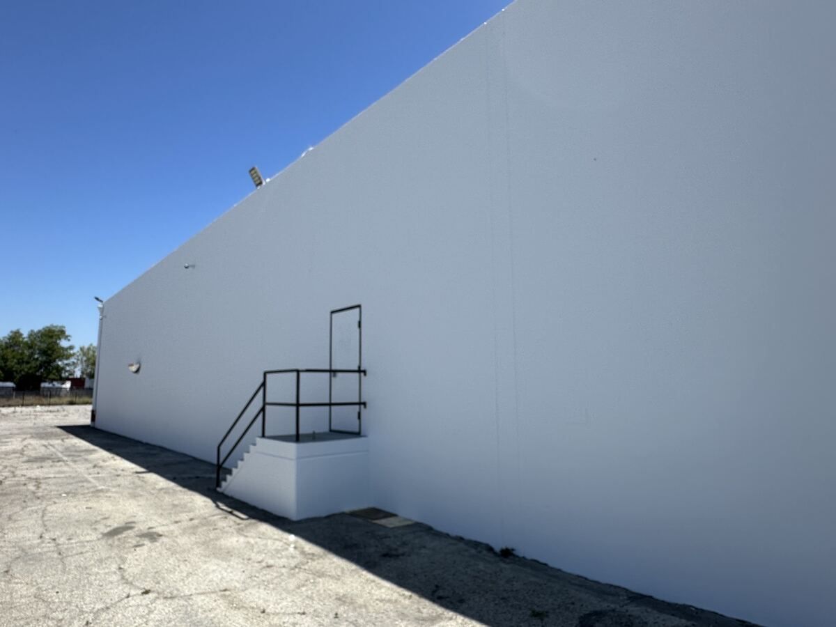 Pentel of America headquarters in Torrance, white tilt-up walls repaired and repainted